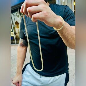 14k Gold over silver beautiful chain amd bracelet set brand new size 22" -8"